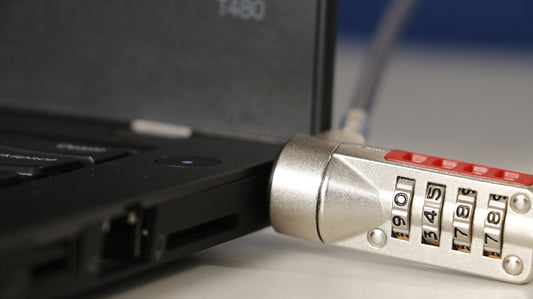 gray flash drive in laptop