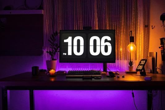 a computer monitor sitting on top of a desk