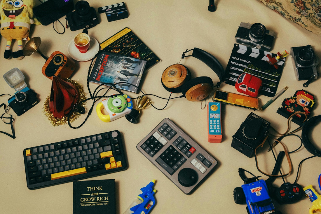 A table topped with lots of toys and electronics
