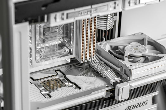 Inside a white computer case with cooling system components